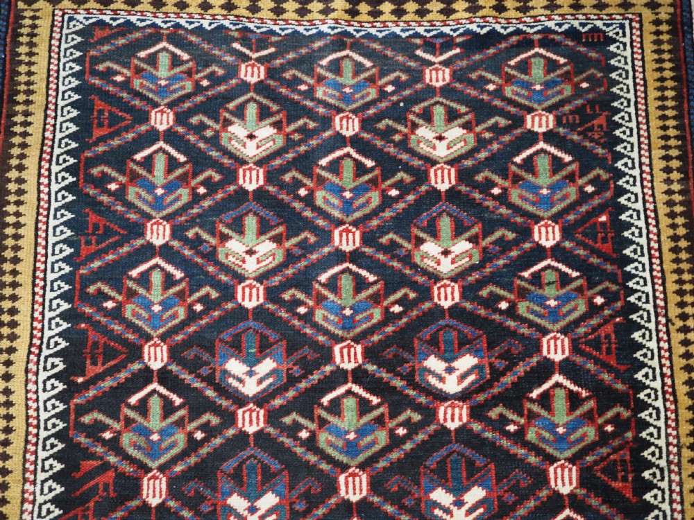 ANTIQUE CAUCASIAN DAGHESTAN RUG, LATTICE DESIGN, OUTSTANDING CONDITION, CIRCA 1900. View V
