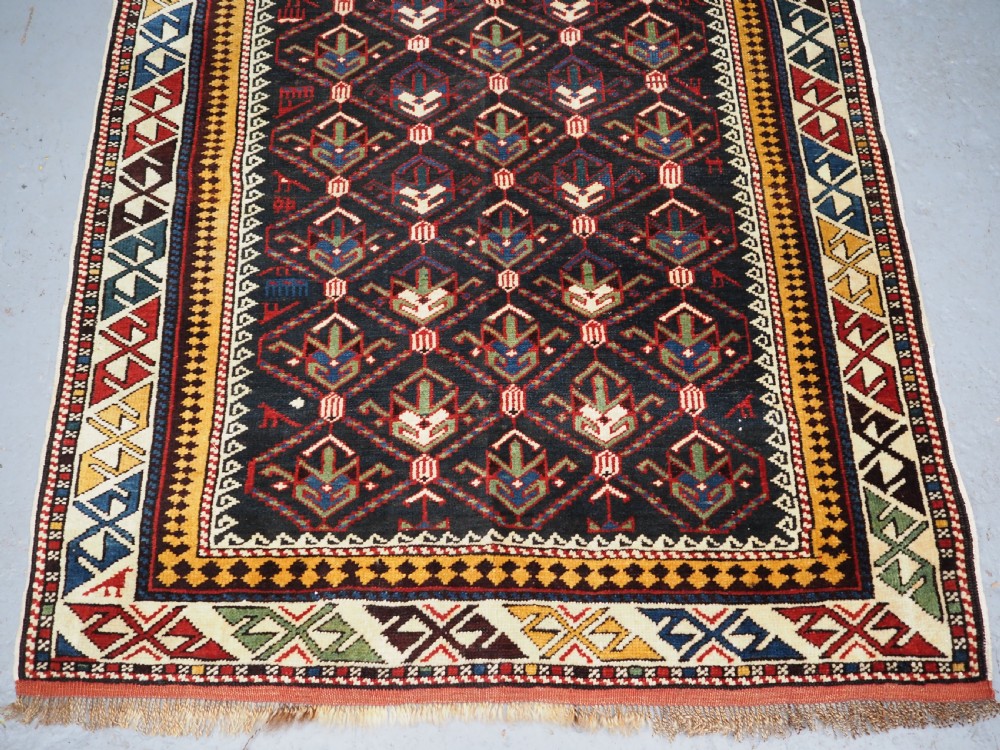 ANTIQUE CAUCASIAN DAGHESTAN RUG, LATTICE DESIGN, OUTSTANDING CONDITION, CIRCA 1900. View VIII
