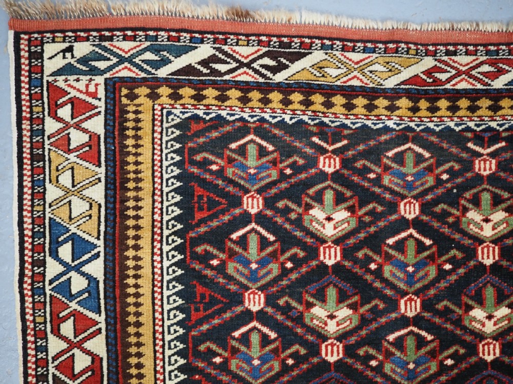ANTIQUE CAUCASIAN DAGHESTAN RUG, LATTICE DESIGN, OUTSTANDING CONDITION, CIRCA 1900. View IX