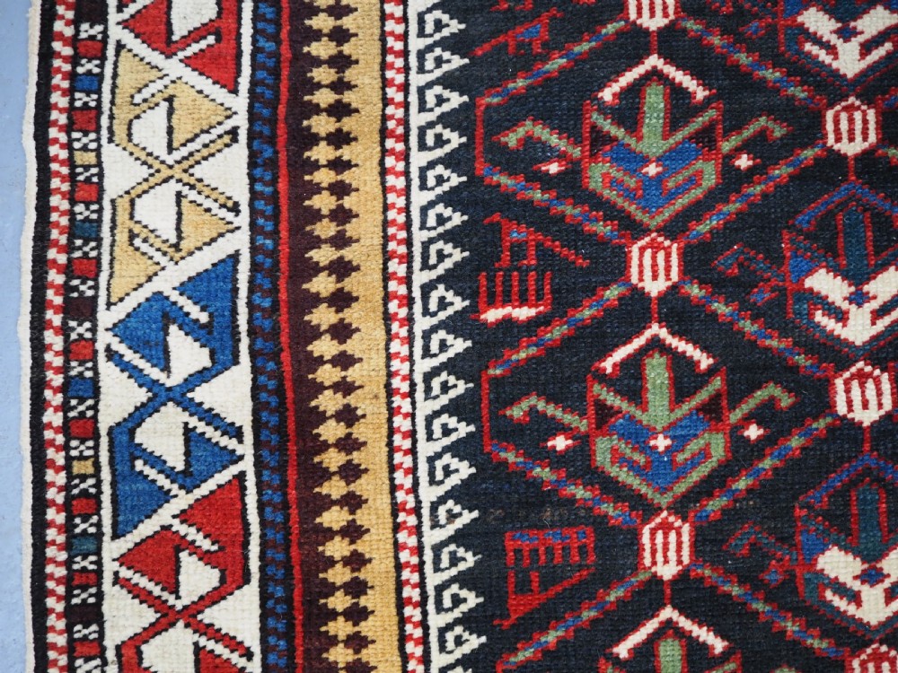 ANTIQUE CAUCASIAN DAGHESTAN RUG, LATTICE DESIGN, OUTSTANDING CONDITION, CIRCA 1900. View X