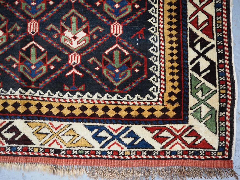 ANTIQUE CAUCASIAN DAGHESTAN RUG, LATTICE DESIGN, OUTSTANDING CONDITION, CIRCA 1900. View XI