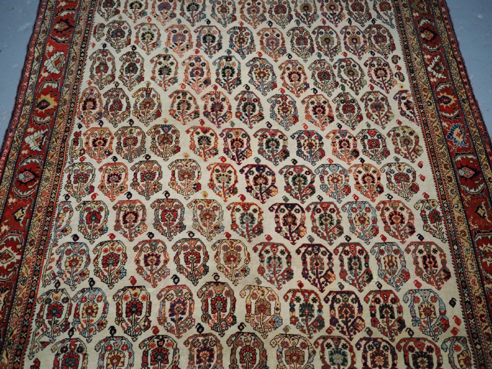 ANTIQUE TRIBAL QASHQAI KASHKULI RUG, SCARCE IVORY GROUND WITH BOTEH, CIRCA 1870/80. View IV
