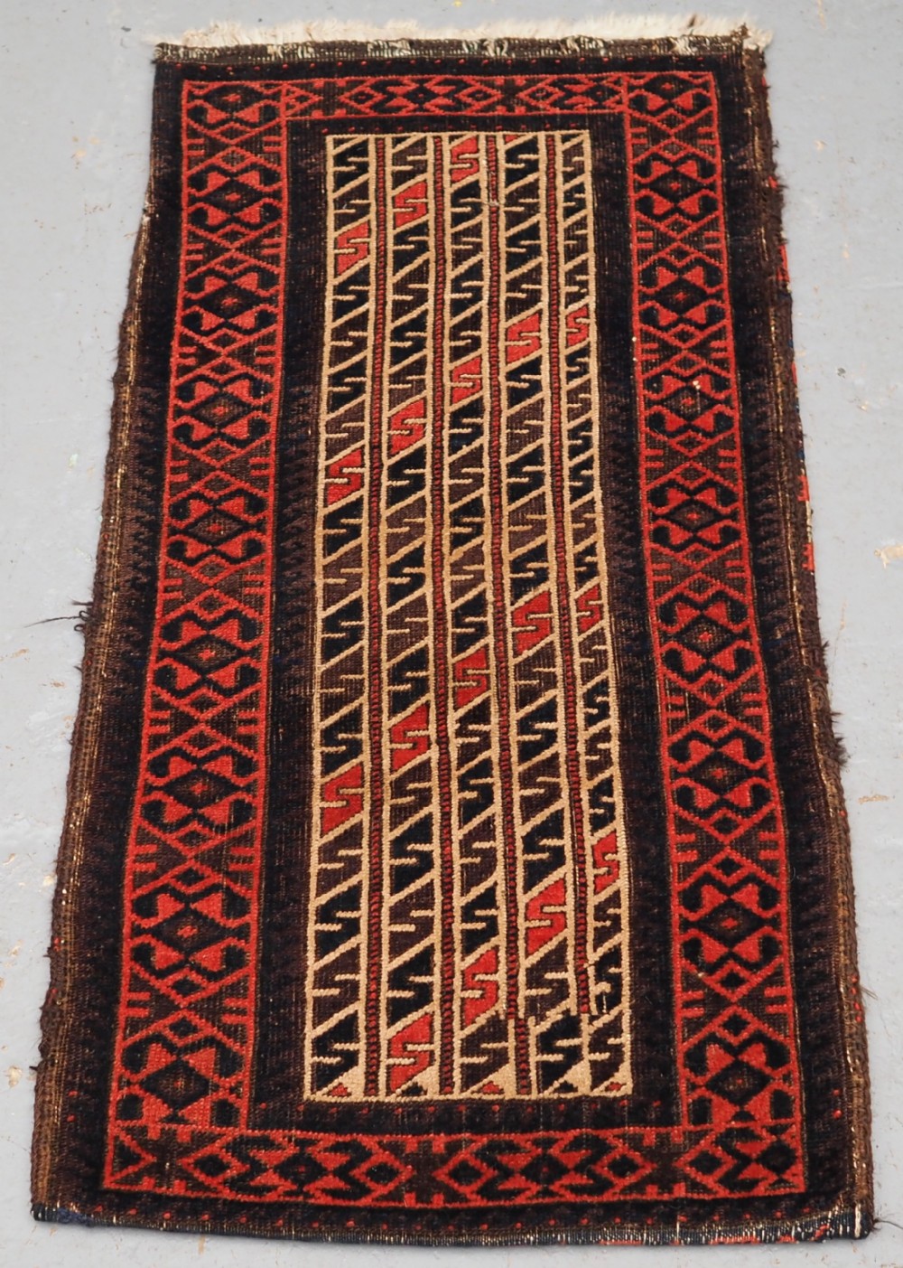 ANTIQUE BALUCH BALISHT OF SCARCE DESIGN, COMPLETE WITH BACK, CIRCA 1890.