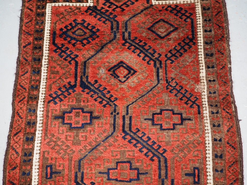 ANTIQUE BALUCH PRAYER RUG WITH LARGE LATTICE DESIGN, CIRCA 1900. View IV
