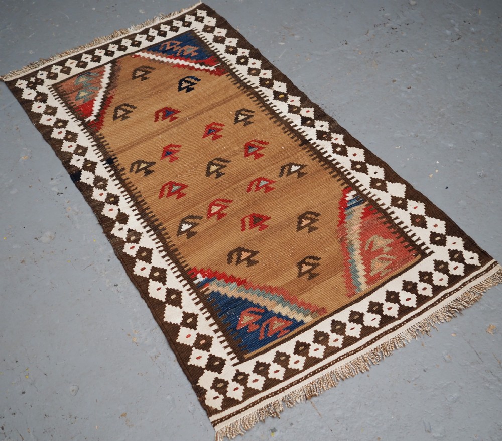 ANTIQUE SMALL TRIBAL KILIM BY THE LURI OR BAKHTIARI, CAMEL WOOL AND COTTON, CIRCA 1900. View II