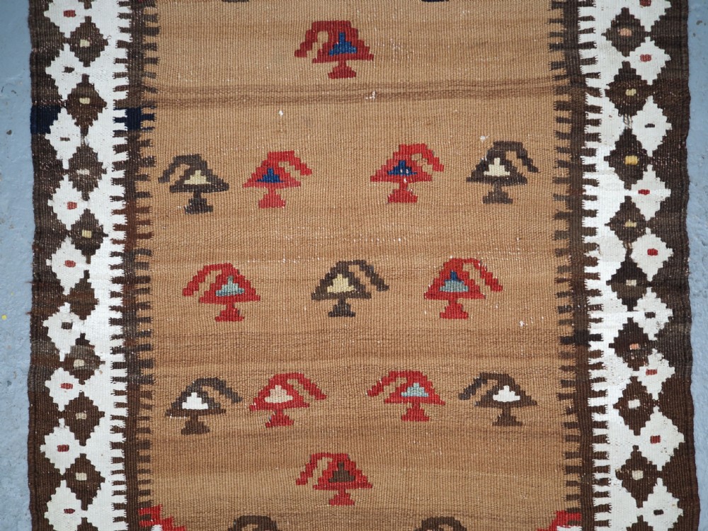ANTIQUE SMALL TRIBAL KILIM BY THE LURI OR BAKHTIARI, CAMEL WOOL AND COTTON, CIRCA 1900. View V