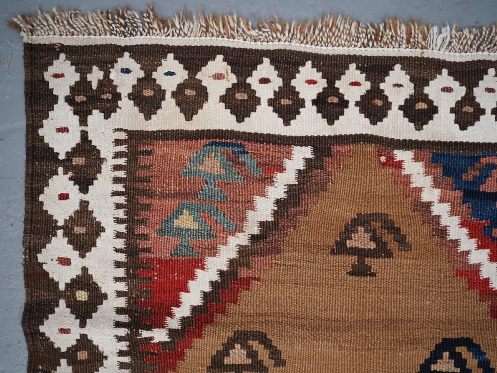 ANTIQUE SMALL TRIBAL KILIM BY THE LURI OR BAKHTIARI, CAMEL WOOL AND COTTON, CIRCA 1900. View VI