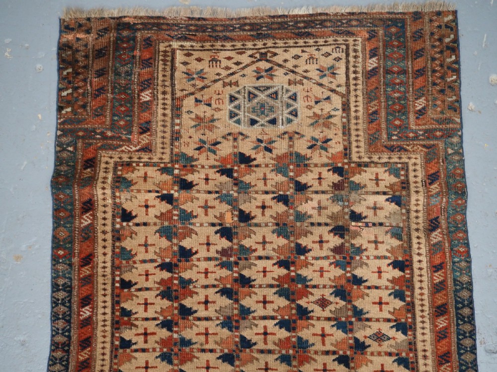ANTIQUE PRAYER RUG BY THE ERSARI TURKMEN OF SCARCE TYPE, CIRCA 1890. View III