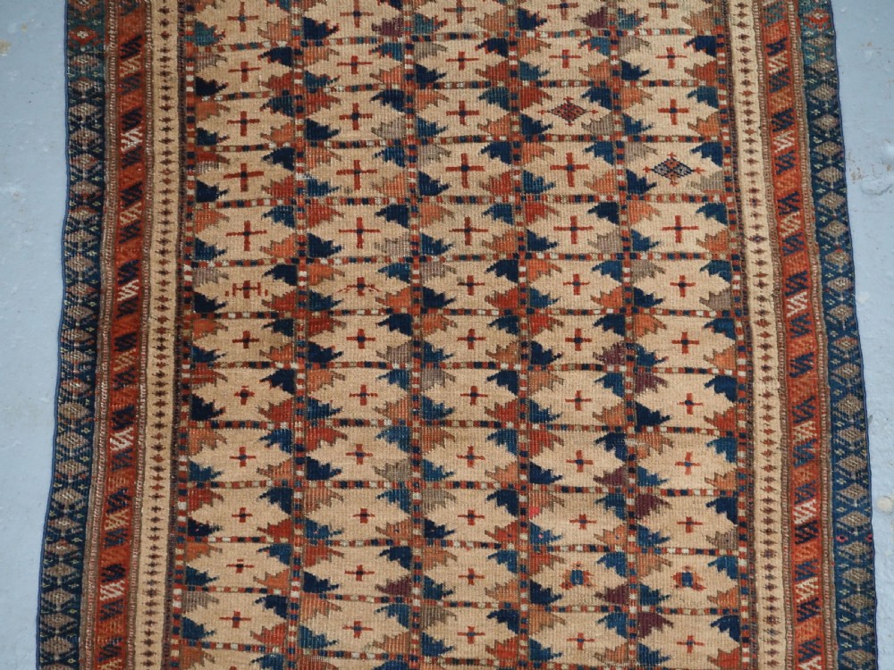 ANTIQUE PRAYER RUG BY THE ERSARI TURKMEN OF SCARCE TYPE, CIRCA 1890. View IV