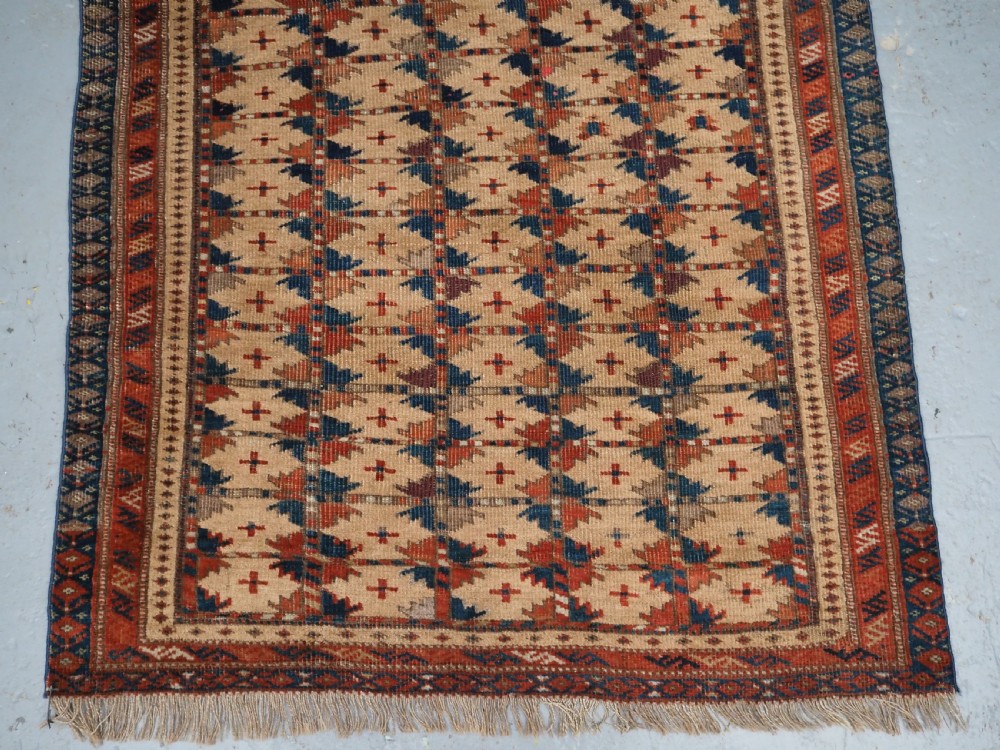 ANTIQUE PRAYER RUG BY THE ERSARI TURKMEN OF SCARCE TYPE, CIRCA 1890. View V