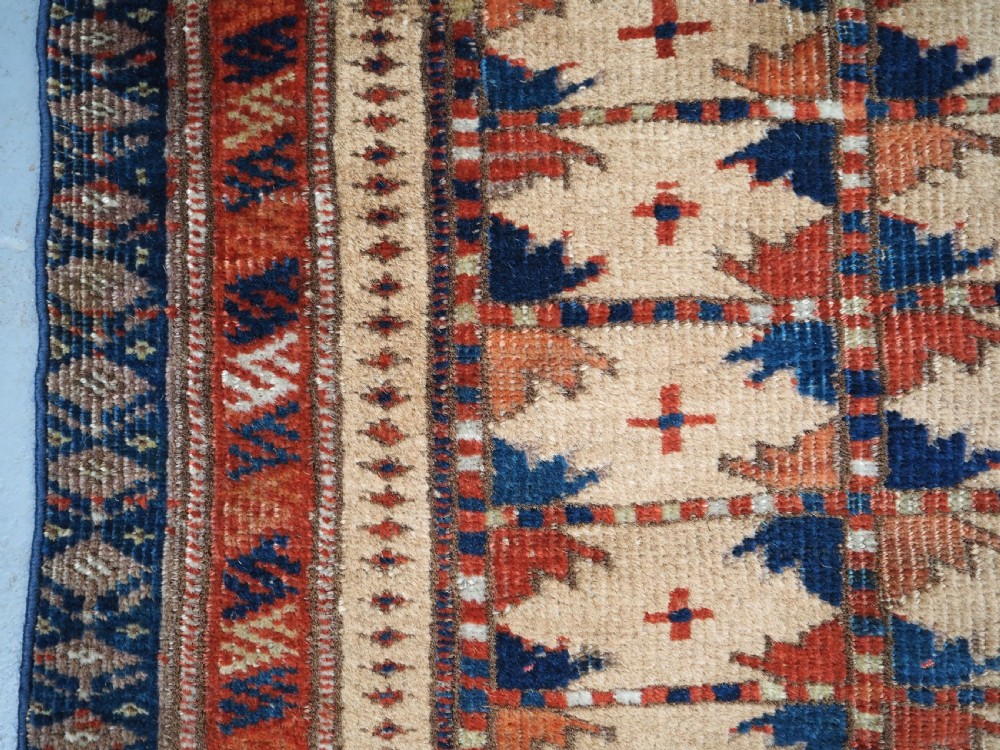 ANTIQUE PRAYER RUG BY THE ERSARI TURKMEN OF SCARCE TYPE, CIRCA 1890. View VIII