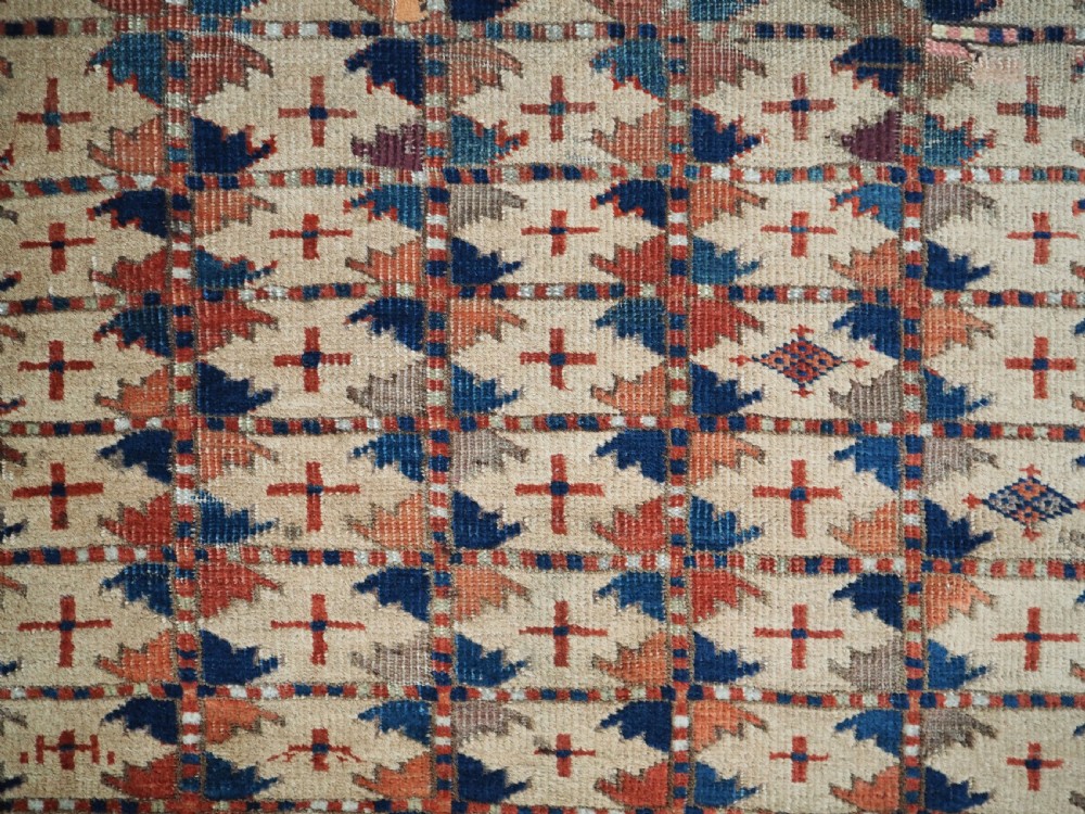 ANTIQUE PRAYER RUG BY THE ERSARI TURKMEN OF SCARCE TYPE, CIRCA 1890. View IX