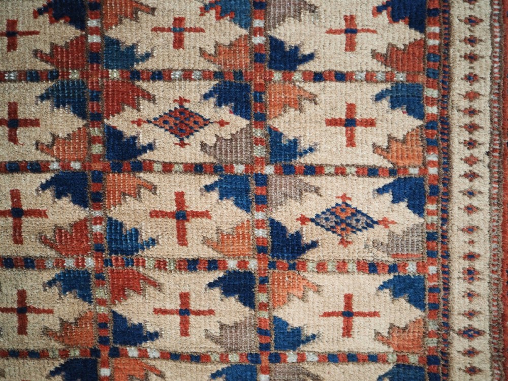 ANTIQUE PRAYER RUG BY THE ERSARI TURKMEN OF SCARCE TYPE, CIRCA 1890. View X