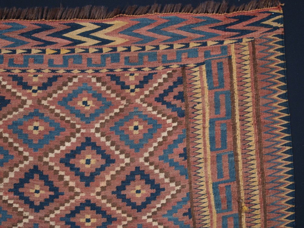 ANTIQUE UZBEK BAG FACE, PLAIN WEAVE WITH TRADITIONAL DESIGN, CIRCA 1900. View III