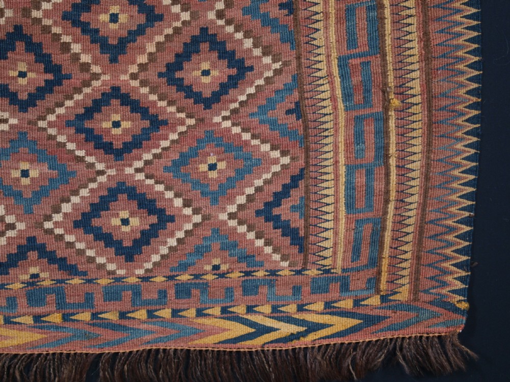 ANTIQUE UZBEK BAG FACE, PLAIN WEAVE WITH TRADITIONAL DESIGN, CIRCA 1900. View V