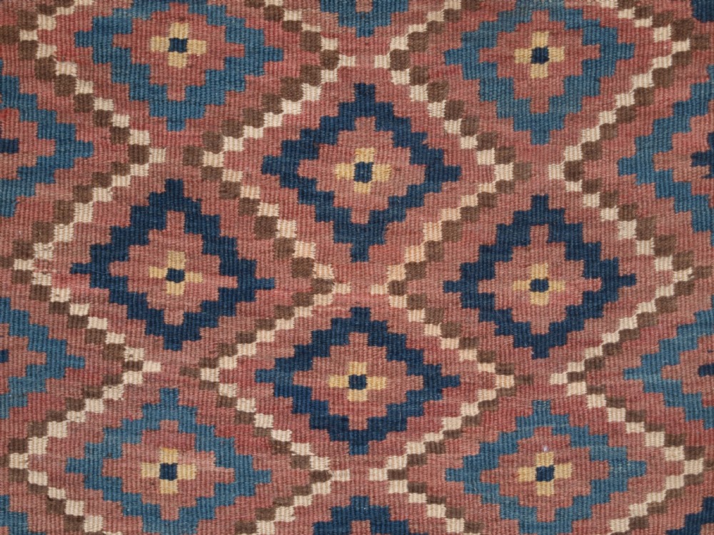 ANTIQUE UZBEK BAG FACE, PLAIN WEAVE WITH TRADITIONAL DESIGN, CIRCA 1900. View VI
