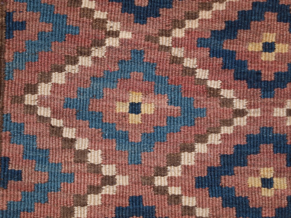 ANTIQUE UZBEK BAG FACE, PLAIN WEAVE WITH TRADITIONAL DESIGN, CIRCA 1900. View VII