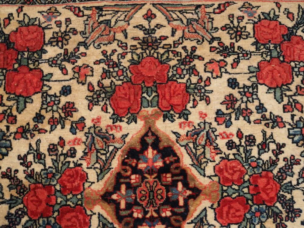 ANTIQUE BIJAR RUG OF SMALL SQUARE PUSHTI SIZE, FLORAL DESIGN, CIRCA 1890. View III