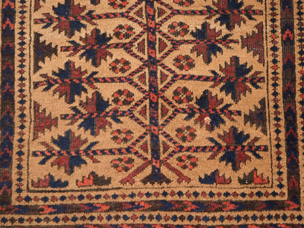 ANTIQUE BALUCH CAMEL GROUND PRAYER RUG WITH TREE OF LIFE, CIRCA 1900. View IX