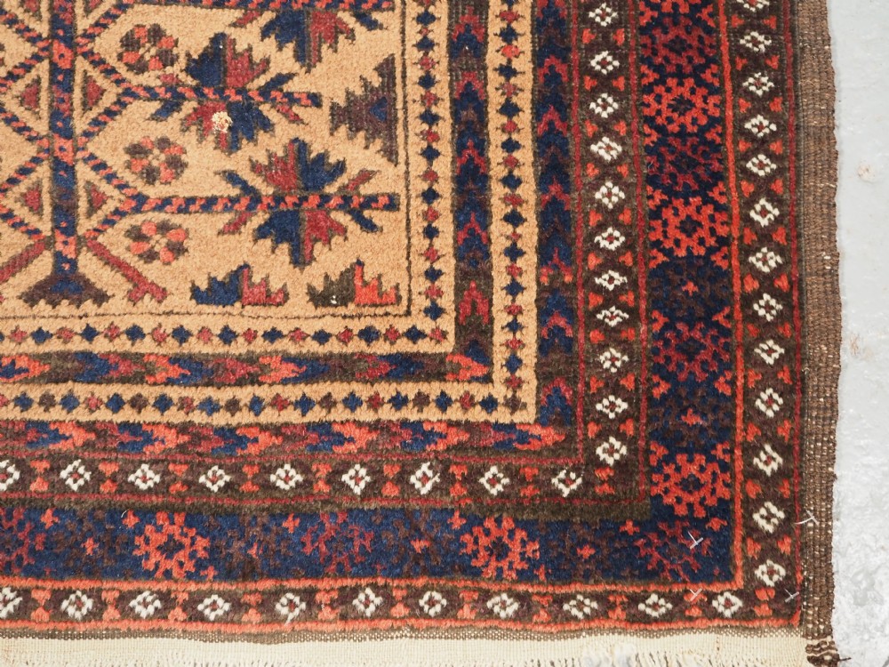 ANTIQUE BALUCH CAMEL GROUND PRAYER RUG WITH TREE OF LIFE, CIRCA 1900. View X