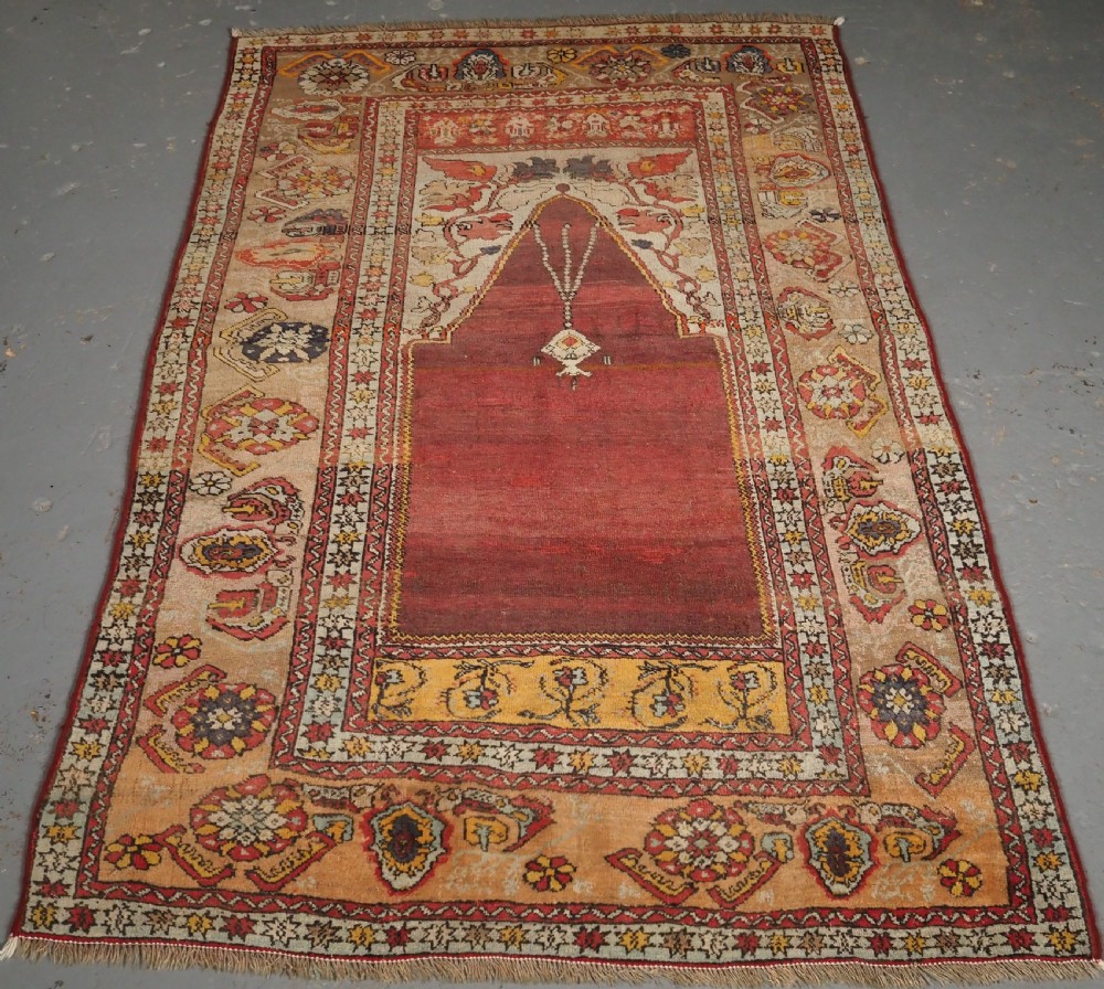 ANTIQUE TURKISH OUSHAK REGION PRAYER RUG, LATE 19TH CENTURY.
