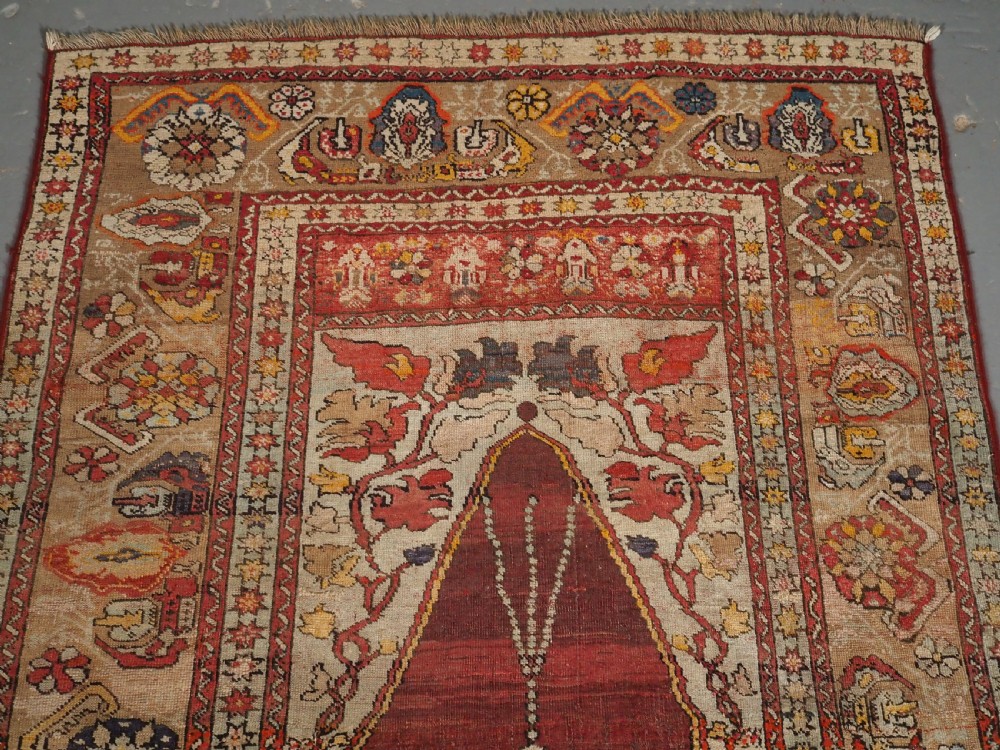 ANTIQUE TURKISH OUSHAK REGION PRAYER RUG, LATE 19TH CENTURY. View III