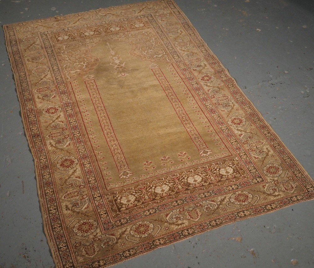 ANTIQUE TURKISH GHIORDES PRAYER RUG, GREEN GROUND, EARLY 19TH CENTURY. View II