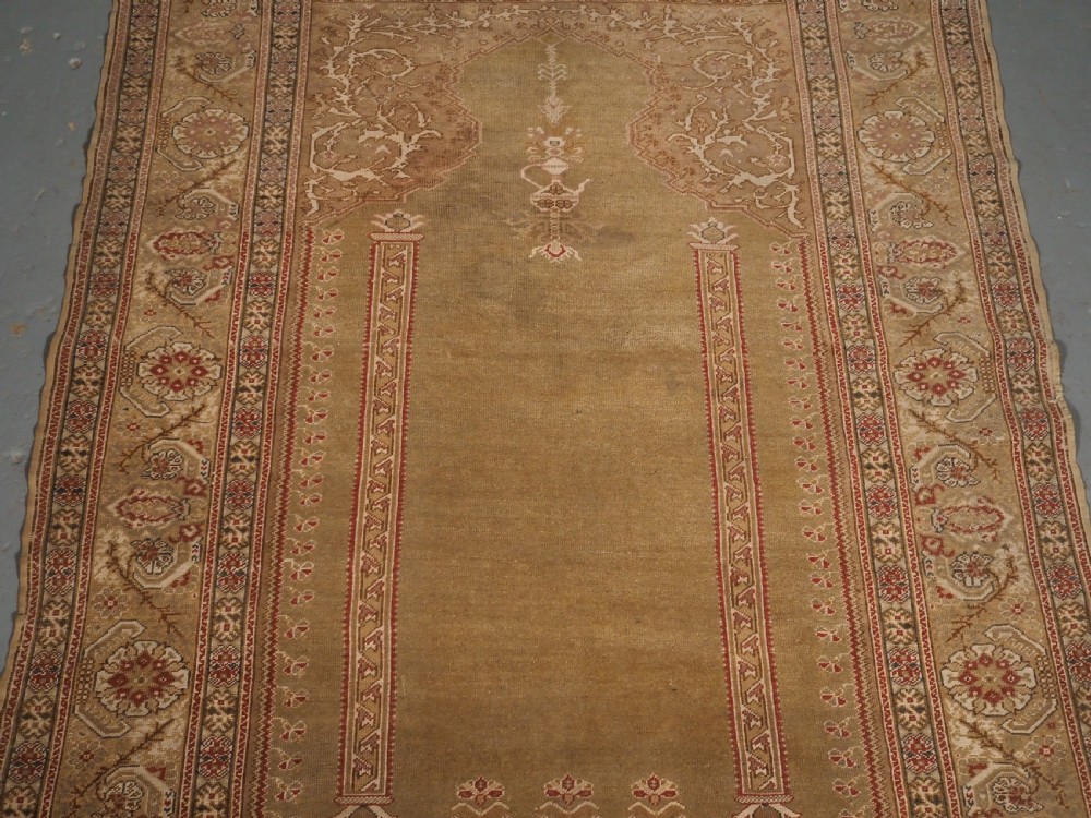ANTIQUE TURKISH GHIORDES PRAYER RUG, GREEN GROUND, EARLY 19TH CENTURY. View IV