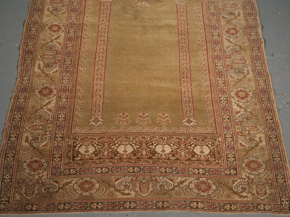 ANTIQUE TURKISH GHIORDES PRAYER RUG, GREEN GROUND, EARLY 19TH CENTURY. View VI