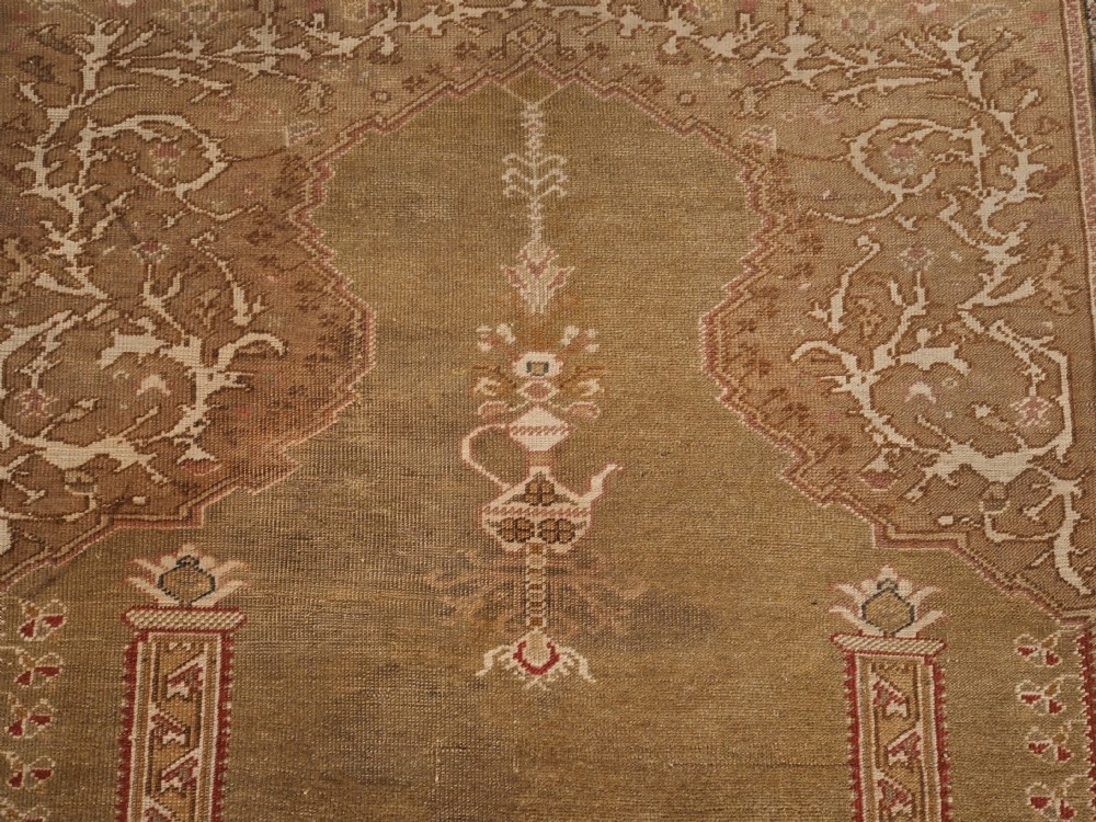 ANTIQUE TURKISH GHIORDES PRAYER RUG, GREEN GROUND, EARLY 19TH CENTURY. View VIII
