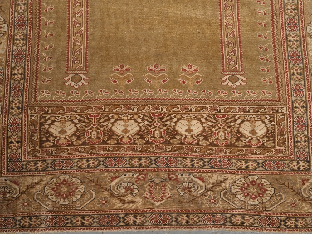 ANTIQUE TURKISH GHIORDES PRAYER RUG, GREEN GROUND, EARLY 19TH CENTURY. View IX