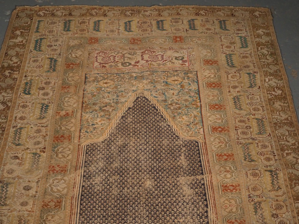 ANTIQUE TURKISH GHIORDES PRAYER RUG, BLUE GROUND, 18TH CENTURY. View III