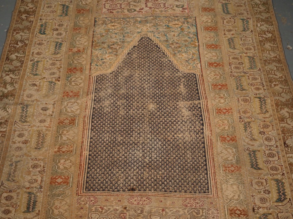 ANTIQUE TURKISH GHIORDES PRAYER RUG, BLUE GROUND, 18TH CENTURY. View IV