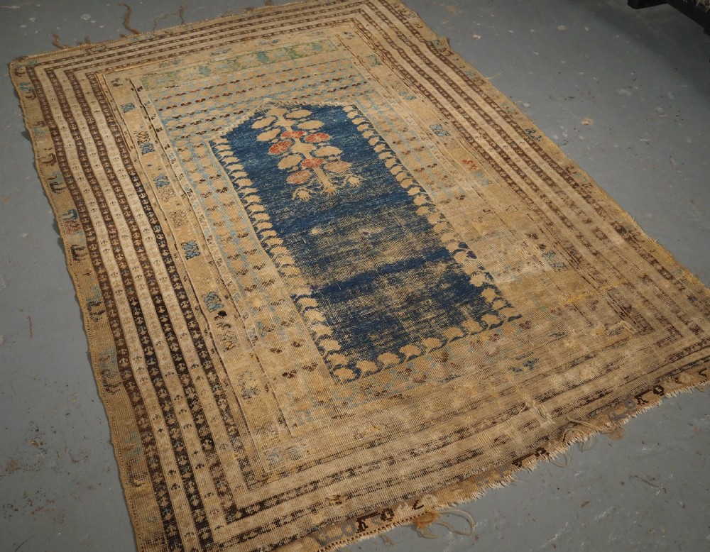 ANTIQUE TURKISH GHIORDES PRAYER RUG OF SCARCE EARLY DESIGN, 18TH CENTURY. View II