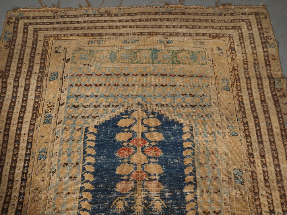 ANTIQUE TURKISH GHIORDES PRAYER RUG OF SCARCE EARLY DESIGN, 18TH CENTURY. View III