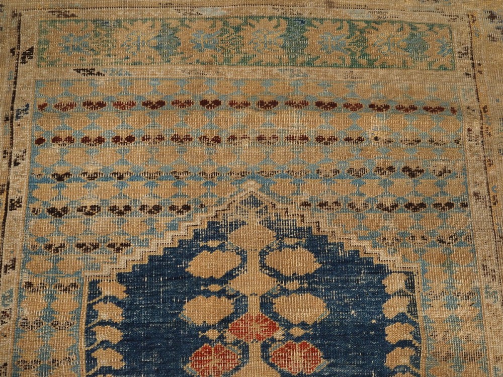 ANTIQUE TURKISH GHIORDES PRAYER RUG OF SCARCE EARLY DESIGN, 18TH CENTURY. View VIII