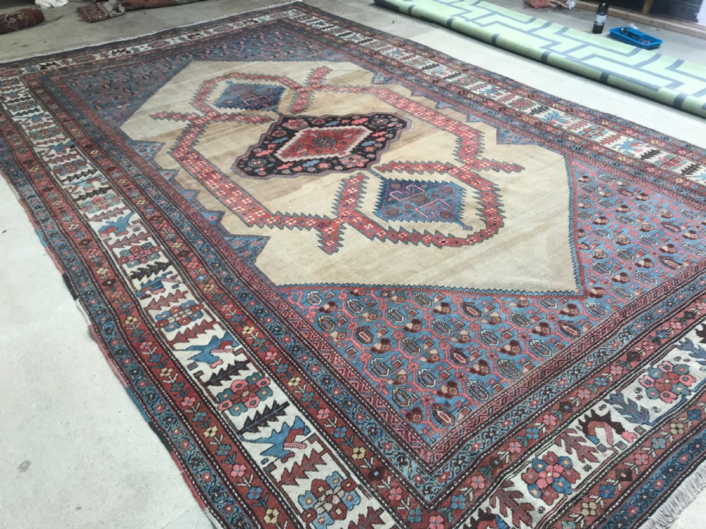 ANTIQUE BAKSHAISH VILLAGE CARPET, LARGE SIZE WITH CAMEL GROUND, CIRCA 1880. View III