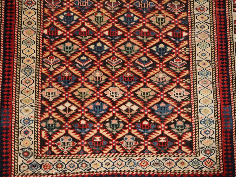 ANTIQUE CAUCASIAN KUBA SHIRVAN RUG OF FLORAL LATTICE DESIGN, CIRCA 1880. View XI