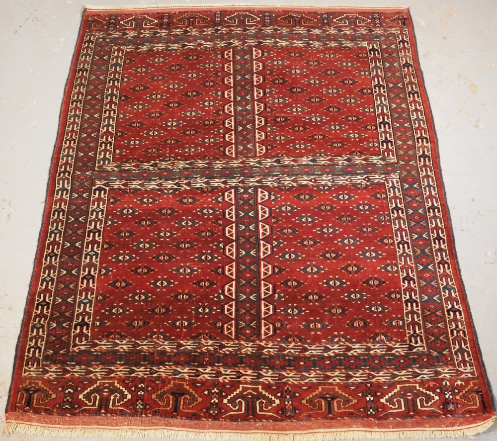 ANTIQUE YOMUT TURKMEN ENSI WITH EAGLE HEAD DESIGN ELEM, CIRCA 1900.