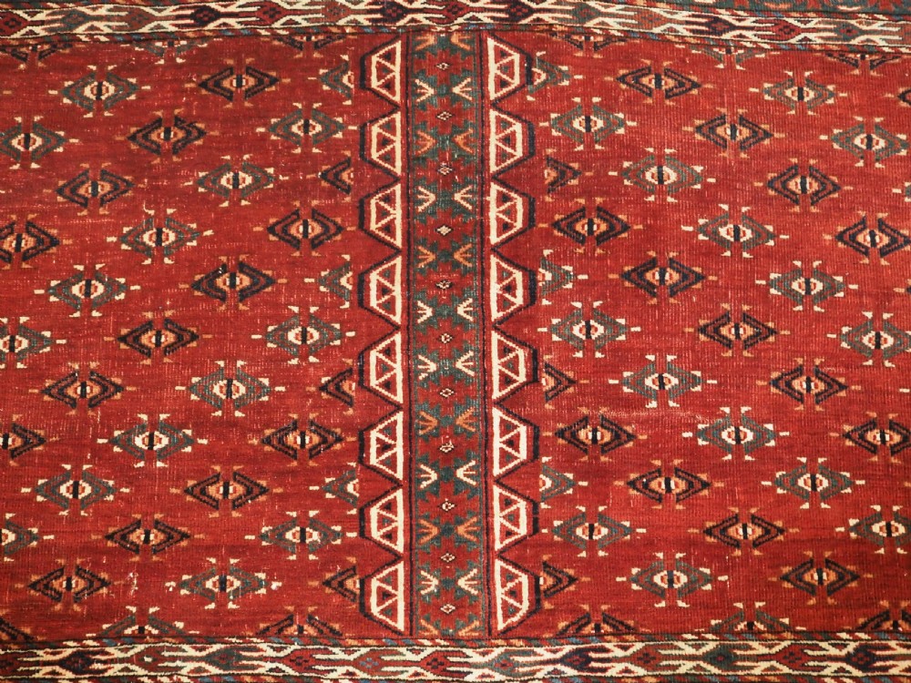 ANTIQUE YOMUT TURKMEN ENSI WITH EAGLE HEAD DESIGN ELEM, CIRCA 1900. View VI