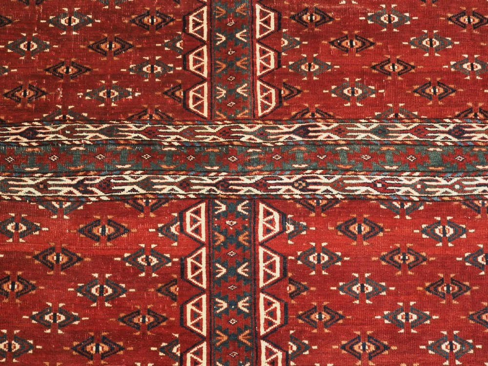 ANTIQUE YOMUT TURKMEN ENSI WITH EAGLE HEAD DESIGN ELEM, CIRCA 1900. View VIII