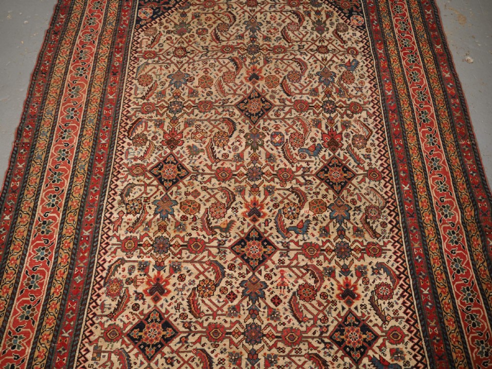 ANTIQUE QASHQAI LONG RUG, IVORY GROUND HERATI DESIGN WITH TIBAL ELEMENTS,  CIRCA 1870. View III