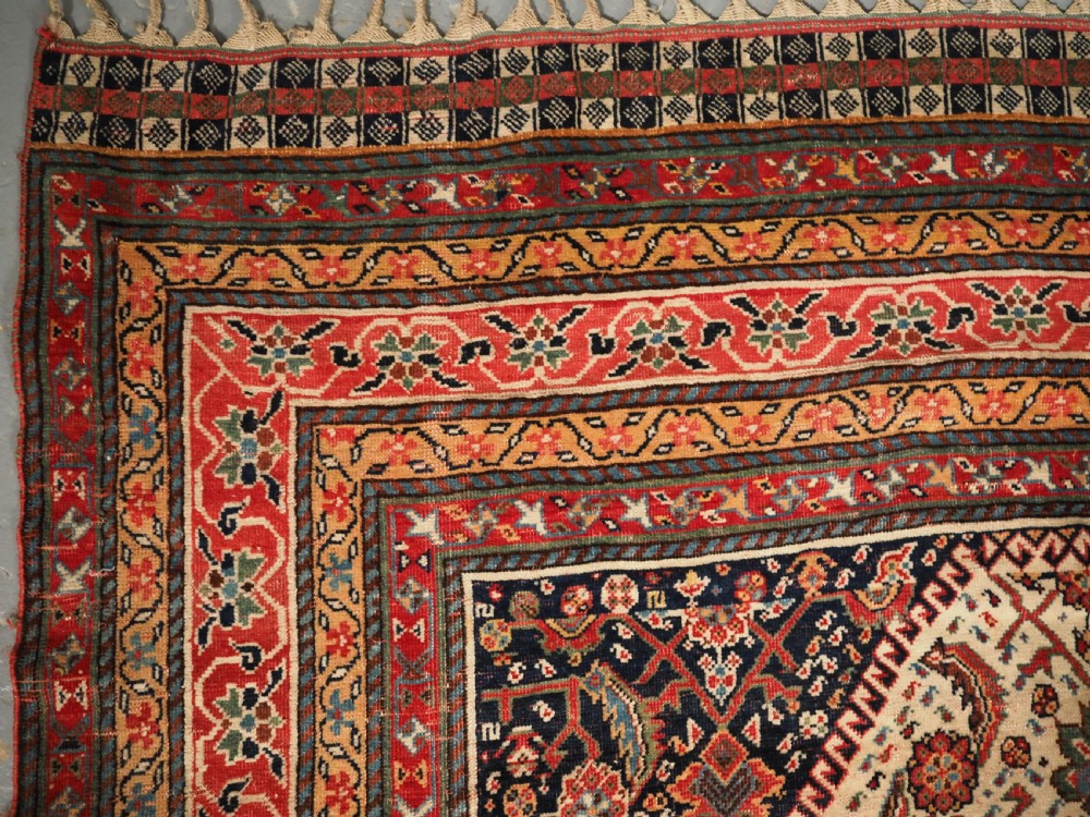 ANTIQUE QASHQAI LONG RUG, IVORY GROUND HERATI DESIGN WITH TIBAL ELEMENTS,  CIRCA 1870. View IV