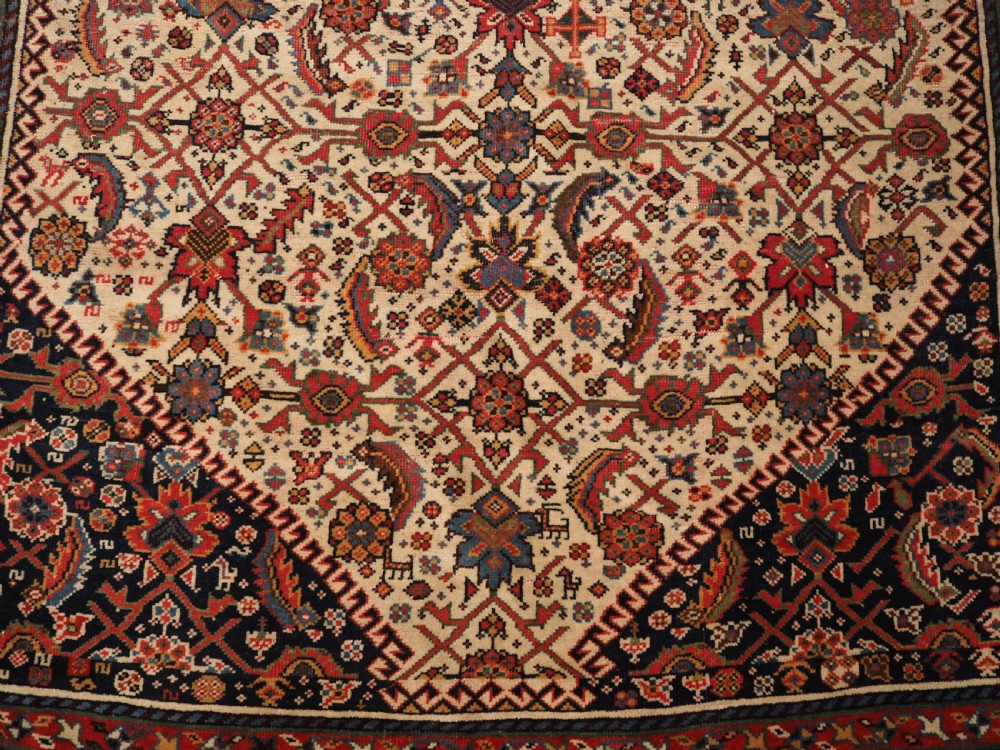 ANTIQUE QASHQAI LONG RUG, IVORY GROUND HERATI DESIGN WITH TIBAL ELEMENTS,  CIRCA 1870. View XV