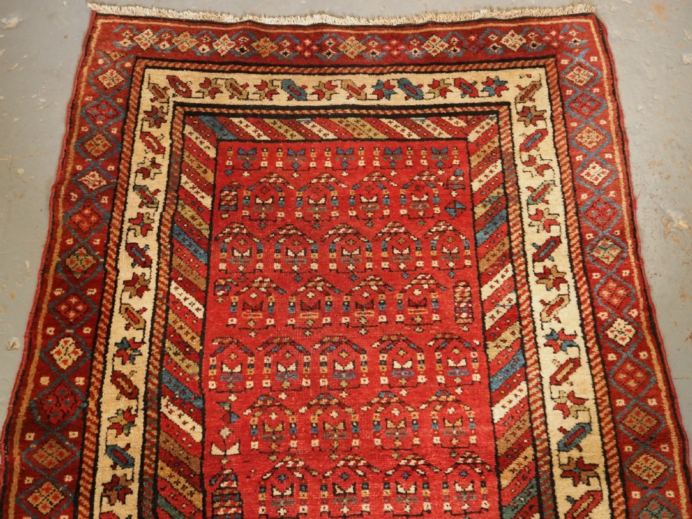 ANTIQUE KURDISH LONG RUG WITH ALL OVER BOTEH DESIGN, CIRCA 1900. View III