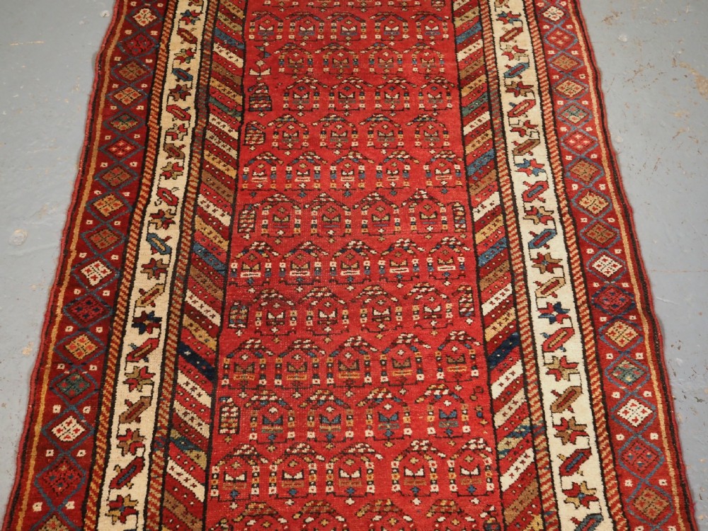 ANTIQUE KURDISH LONG RUG WITH ALL OVER BOTEH DESIGN, CIRCA 1900. View IV