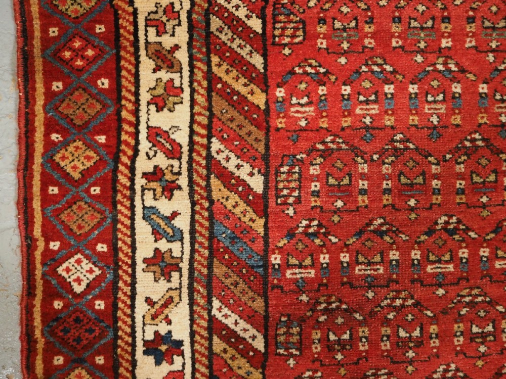 ANTIQUE KURDISH LONG RUG WITH ALL OVER BOTEH DESIGN, CIRCA 1900. View VII