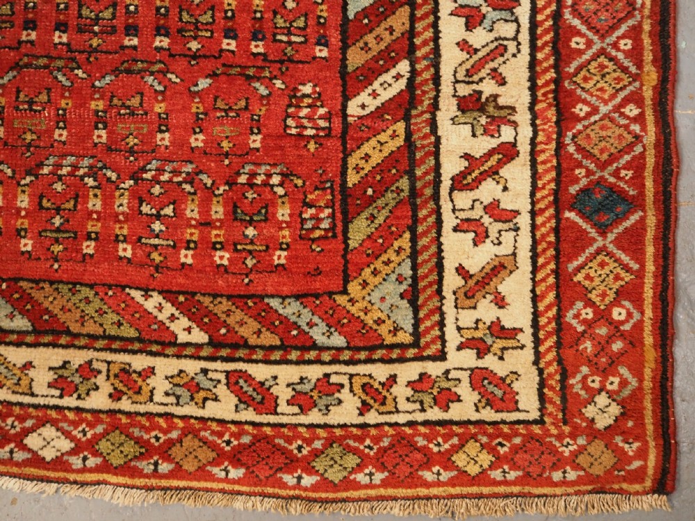 ANTIQUE KURDISH LONG RUG WITH ALL OVER BOTEH DESIGN, CIRCA 1900. View X