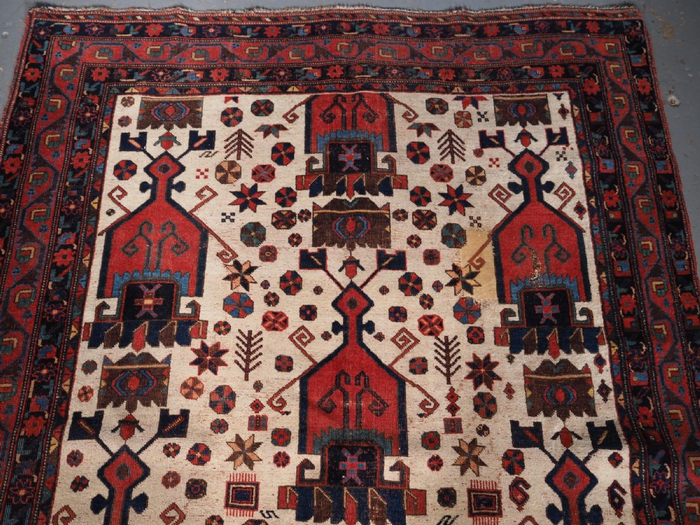 ANTIQUE AFSHAR NERIZ RUG WITH SHIELD DESIGN, CIRCA 1900. View III