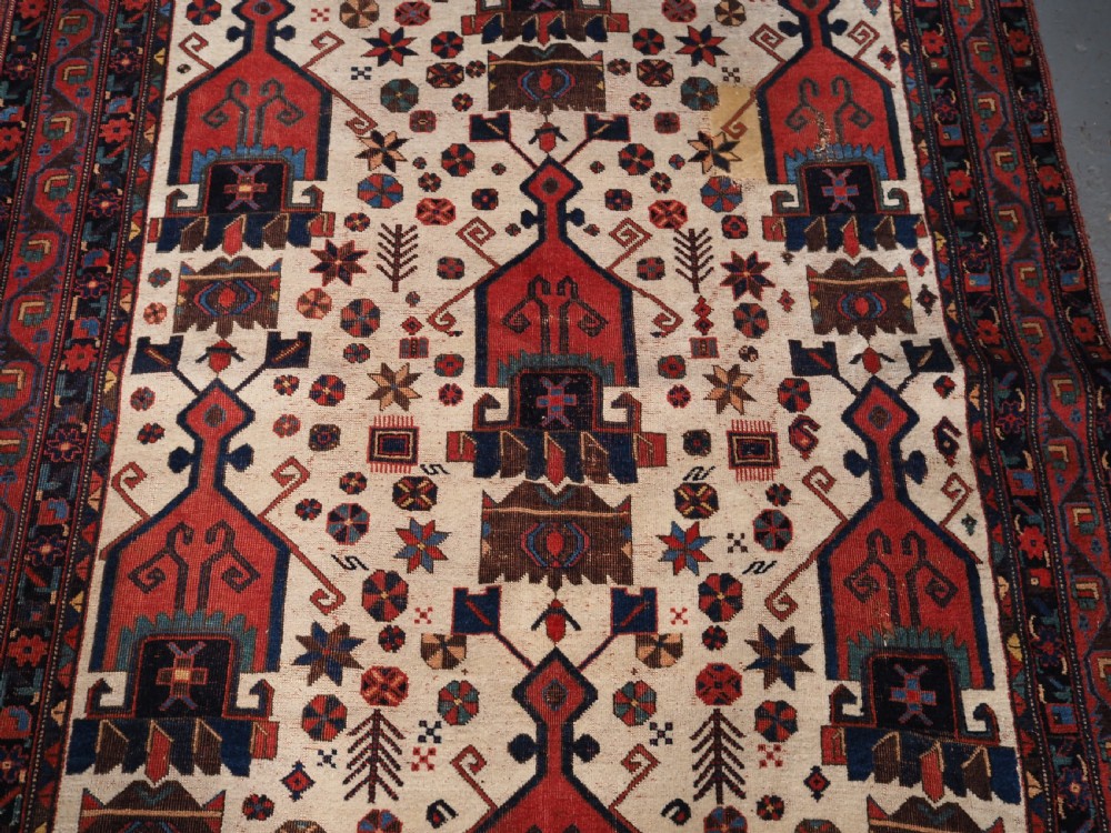 ANTIQUE AFSHAR NERIZ RUG WITH SHIELD DESIGN, CIRCA 1900. View IV